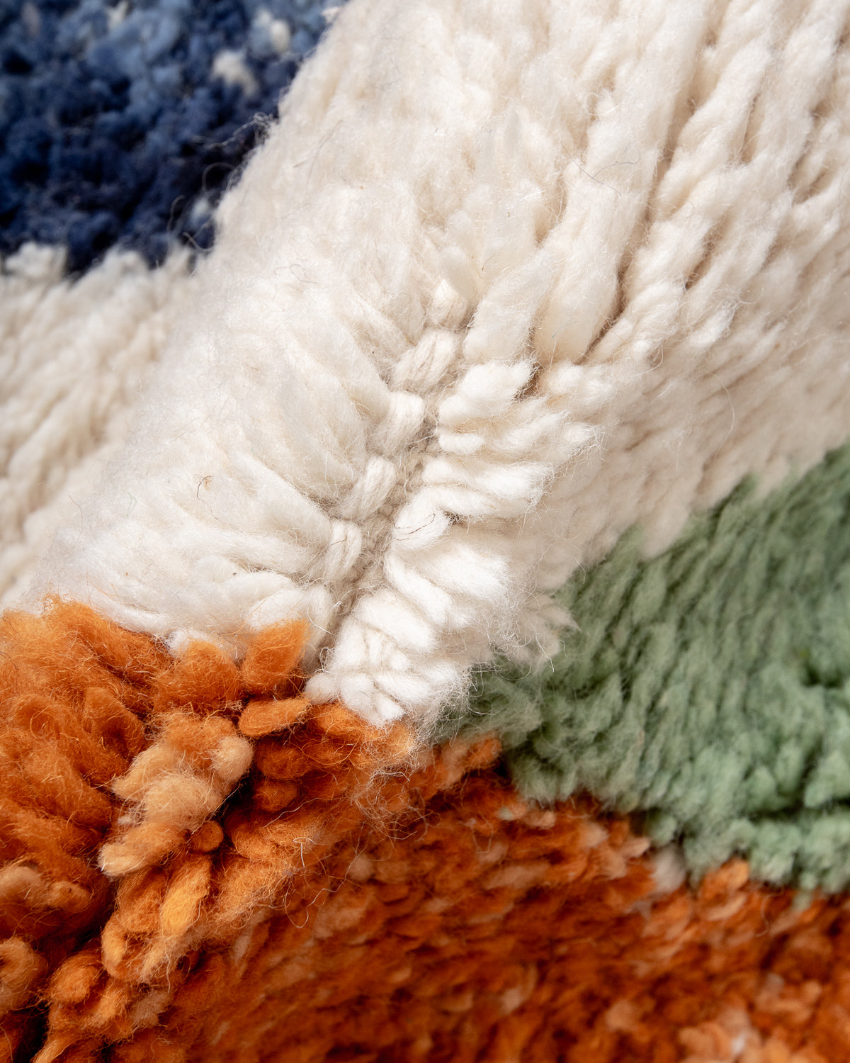 Modern, designer, handcrafted Berber rug from Morocco. Beniourain carpet with beautiful colours and patterns and fluffy wool texture.